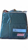 Packaged green Coleman picnic set case with a label tagged 'Brand New Coleman Picnic Set'
