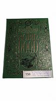Front cover of large green hardcover book with gold foil embossed lettering and design: The Adventures of Robin Hood by Roger Lancelyn Green, with Folio Society insignia.