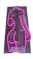 Pink neon LED light shaped like a woman’s body on backing board showing pink LED tubing design