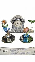 Full set showing Waterford crystal clock, four Swarovski crystal flowers in assorted colors, and two small mirror stands.