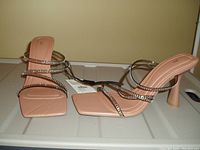 Pair of brown Zara high heel women's sandals with rhinestone decorated straps, square toes, and stiletto heels shown side-by-side on a flat surface.