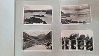 Page showing four black and white photographic cigarette cards featuring landscapes and architectural sites including island view and stone bridge.