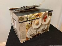 Photo of the original packaging box showing Gibson Elite branding and Golden Anniversary pattern description.