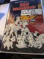 Front cover of VHS case showing title, several Dalmatian puppies and adult Dalmatians in animated style artwork.