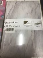 Single boxed MacBook hard shell case with marble pattern and label specifying compatibility with 11.6 inch MacBook Air models A1370/A1465
