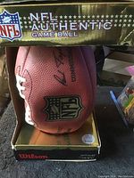 NFL Authentic Game Ball with NFL logo and Wilson branding in original box