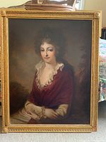 Overall front view of framed oil painting showing full portrait and frame.