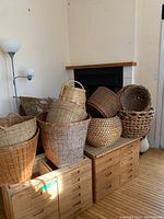 Five baskets arranged on wooden cabinets, showing full lot grouping