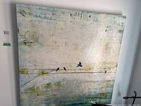 Front view of the stretched canvas wall art showing the bird design and abstract background.