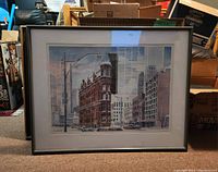 Full view of the framed Flatiron Building print showing the detailed cityscape and the frame.