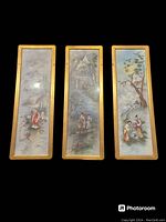 Photo showing all three vertical painted silk panels side by side, framed in gold-colored wood