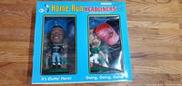 Front view of boxed Sammy Sosa and Mark McGwire Home Run Headliners XL bobblehead figures side by side in blue box with captions visible