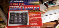 Box front photo shows Storehouse brand 520 piece stainless steel screw and bolt kit with description of included contents and poly cabinet with drawers.
