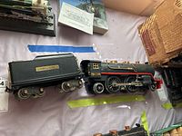 Side view of locomotive and tender on tabletop