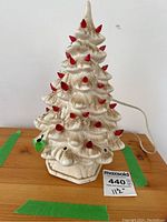 Front view of ceramic Christmas tree showing red bulbs and height reference.