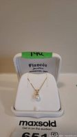 Front view of necklace displayed in Fiancée Jewellers box showing chain and pearl pendant