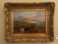 Full front view of framed painting against wall