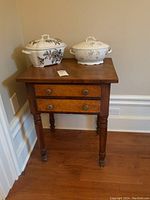 Front view of wooden hall stand with two tureens (not included) on top
