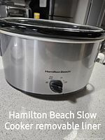 Hamilton Beach slow cooker showing stainless steel exterior and control dial