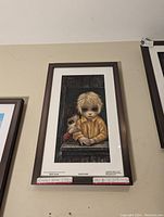 Framed Keane licensed serigraph print showing two children with large eyes, titled 'Sleepytime'.