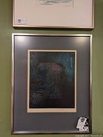 Framed abstract serigraph artwork with dark moody colors, measuring approximately 13x16 inches.
