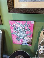 Painting showing a person with white and black outlined tentacles emerging from their mouth on a pink background.