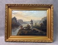 Full front view of framed painting showing ornate gold gilt frame and coastal lighthouse scene