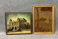 Two vintage framed artworks side by side: left is a framed print of a large building labeled 'ZAGREB', right is a framed natural amber embedded landscape with trees.