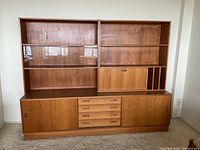 Full front view of assembled three-piece wall unit