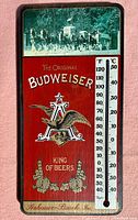 Full view of the wooden Budweiser advertising thermometer showing all design elements and thermometer scale.