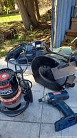Overview photo showing Craftsman router, bench grinder, and Ryobi cordless drill.