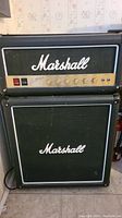 Marshall amplifier for visual comparison to fridge branding and style