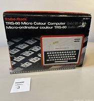 Original retail box of the TRS-80 Micro Colour Computer Model MC-10 with branding and product image.