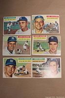 Six 1956 Topps Yankees baseball cards arranged in two rows, showing front of cards with player images and names visible.