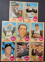 Front view of eight vintage 1968 Topps Pittsburgh Pirates baseball cards displaying player portraits and team label