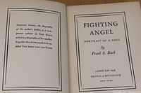 Open interior pages showing the title page of the biography Fighting Angel by Pearl S. Buck published by John Day, Reynal & Hitchcock.