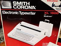 Close up photo of the original Smith Corona XL 1500 electronic typewriter box showing brand logo and model.