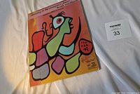 Colorful abstract cover of the book Dancing in the Dragon's Jaw by Bruce Cockburn