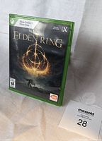 Front cover of the Elden Ring game case for Xbox Series X and Xbox One showing cover art and branding.