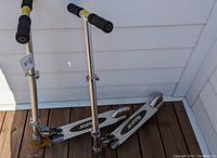 Two Razor scooters side by side showing overall condition and features.