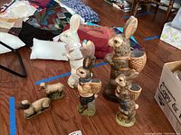 Overview of all six ceramic figurines arranged together