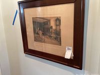 Framed vintage art print hanging on wall with Wallace Nutting signature visible.