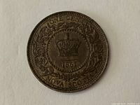 Reverse side of 1861 Nova Scotia one cent penny coin showing crown, date, and NOVA SCOTIA inscription.