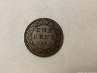 Reverse side of the 1891 Canadian Large Penny showing denomination 'ONE CENT 1891' with wreath detail.