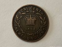 Reverse side of 1896 Newfoundland one cent coin showing crown, date, wreath, and denomination.