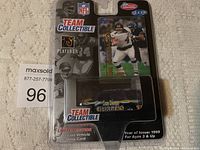 Front view of the sealed Fleer Team Collectible package showing the diecast vehicle and trading card with San Diego Chargers branding.