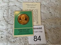 Solid Franklin Bronze proof coin commemorating Governor William T. Cahill with original green display case and information card.