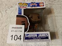 LeBron James Funko POP! vinyl figure inside its original box with front view showing branding and figure.