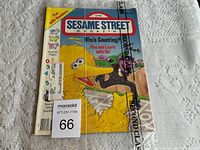 Sealed 1992 Sesame Street Magazine in original postal packaging, showing cover with Big Bird and Count Von Count, labeled as lot 66.