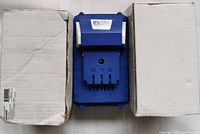 Three blue Snow Joe rechargeable batteries with ventilation slots, white side clips, and Snow Joe logo, two white cardboard boxes included.